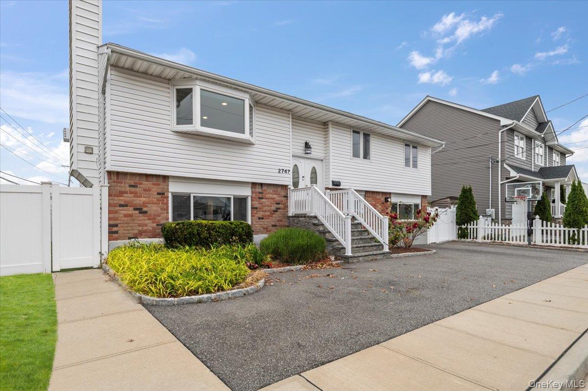 2747 Barbara Road Bellmore, NY 11710 - Photo 2 of 30 Front Of The House From The Side