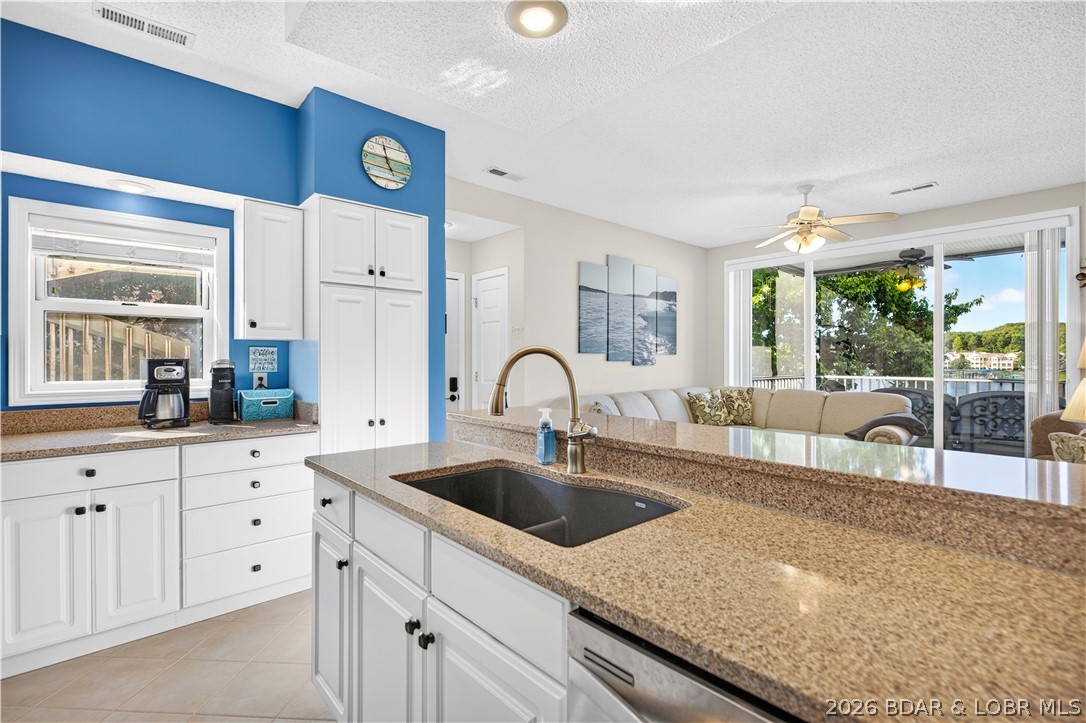 73 Evergreen Road, Unit 3A Sunrise Beach, MO 65079 - Photo 20 of 89 Spacious counter tops, plenty of cabinets, a windo