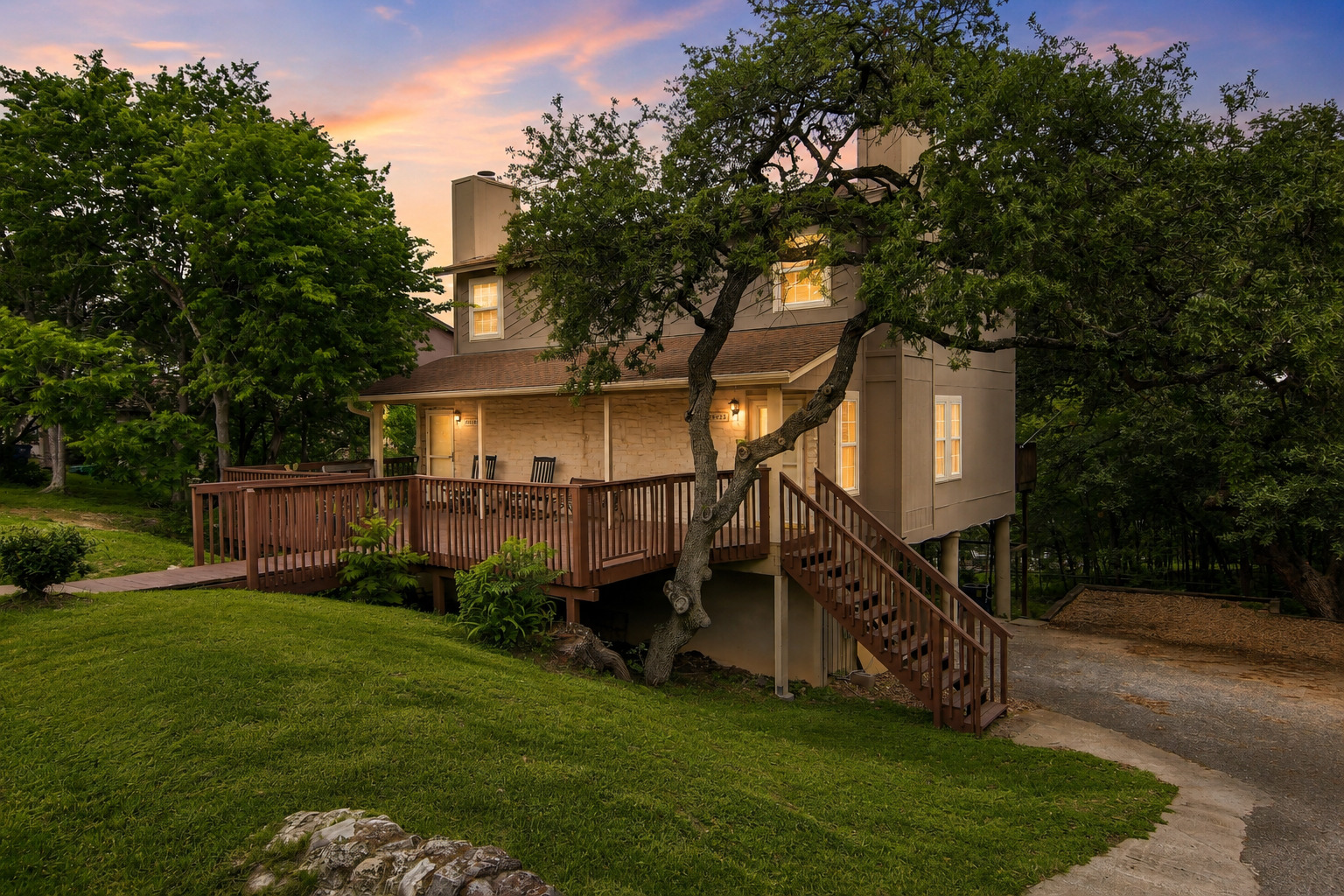 6902 Rifle Bend Austin, TX 78736 - Photo 2 of 33 a view of backyard with deck and garden