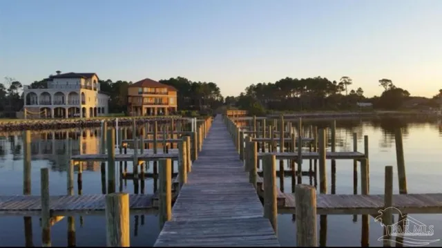 a view of a lake with sitting area