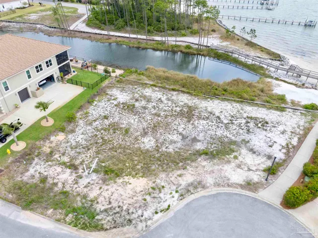 a view of a swimming pool with a yard