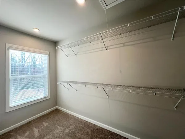 a view of a room with racks on the wall