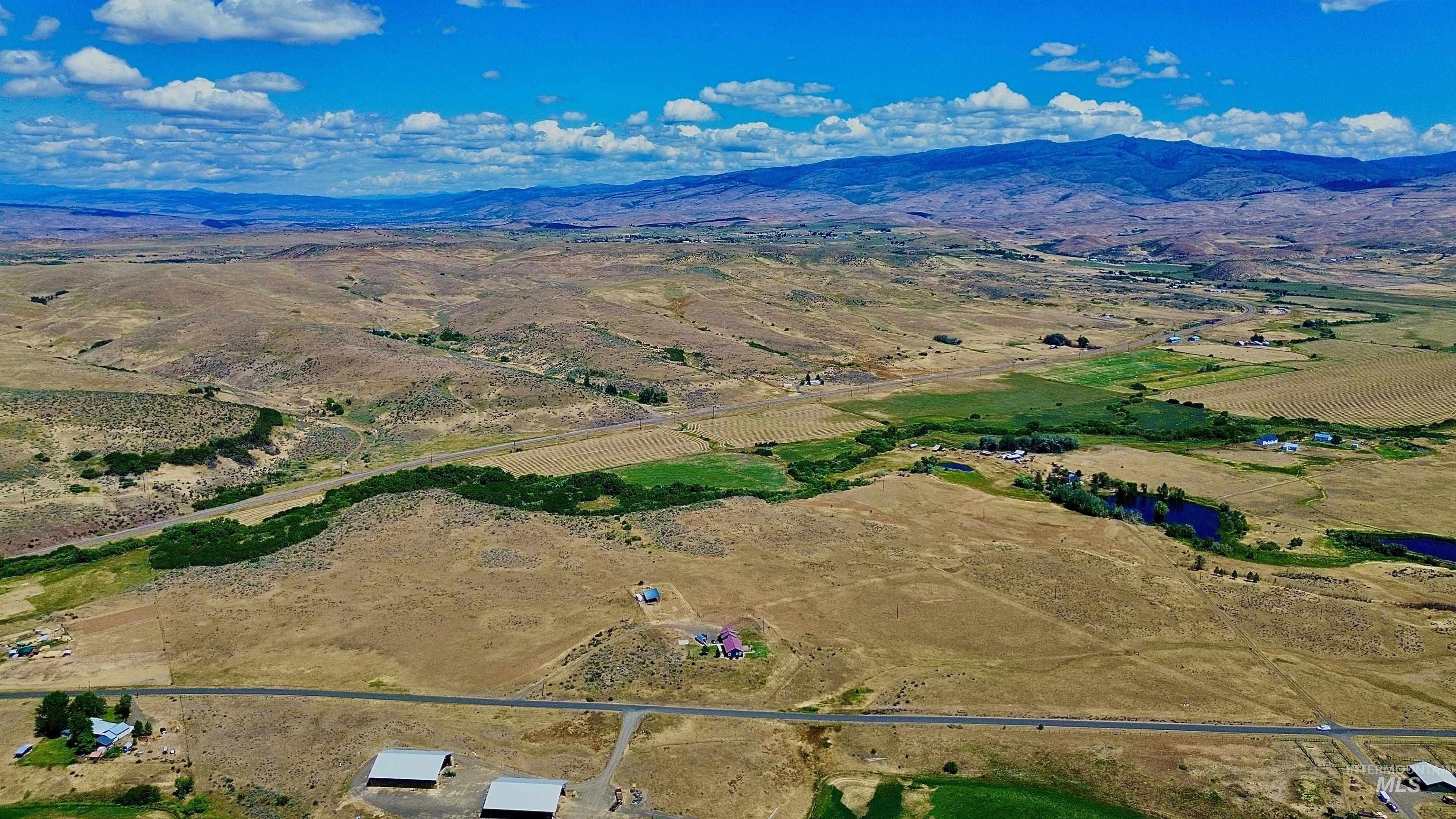 Nka West Indian Valley Road Indian Valley, ID 83632 - Photo 2 of 14 Overview of rural landscape featuring a mountain backdrop