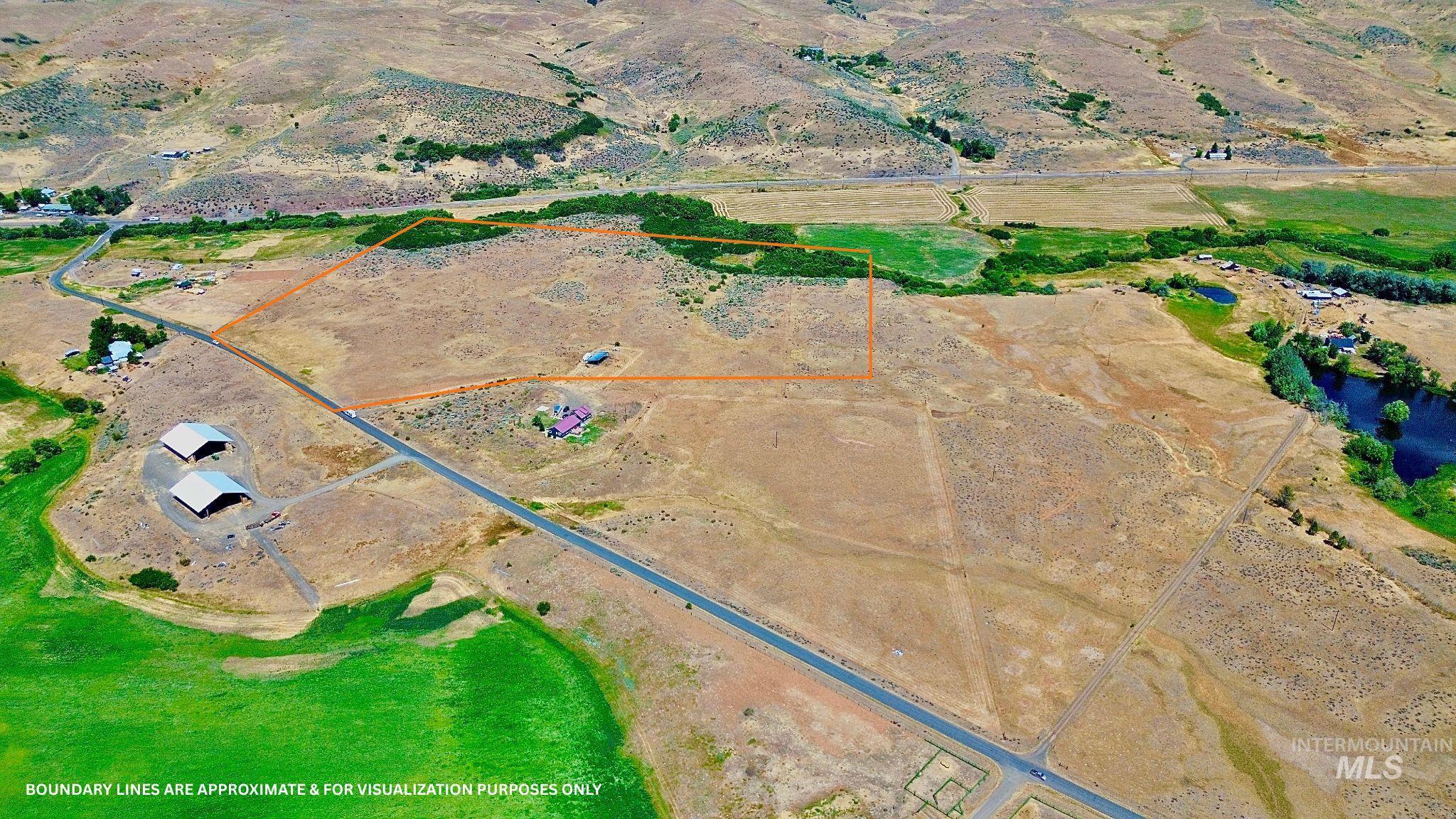 Nka West Indian Valley Road Indian Valley, ID 83632 - Photo 4 of 14 Aerial view of sparsely populated area featuring property parcel outlined