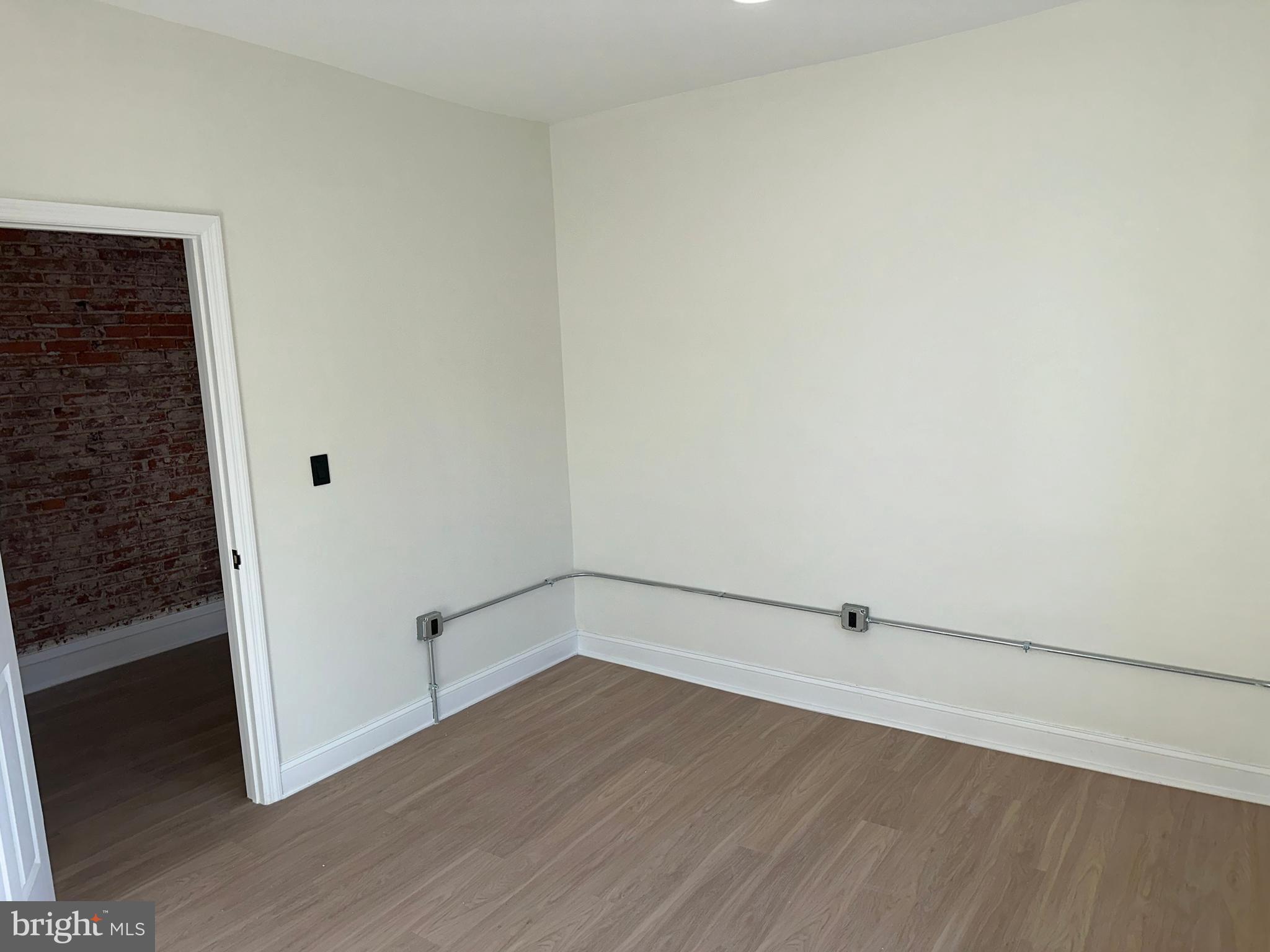 2000 Palethorp Street Philadelphia, PA 19122 - Photo 19 of 38 wooden floor in an empty room