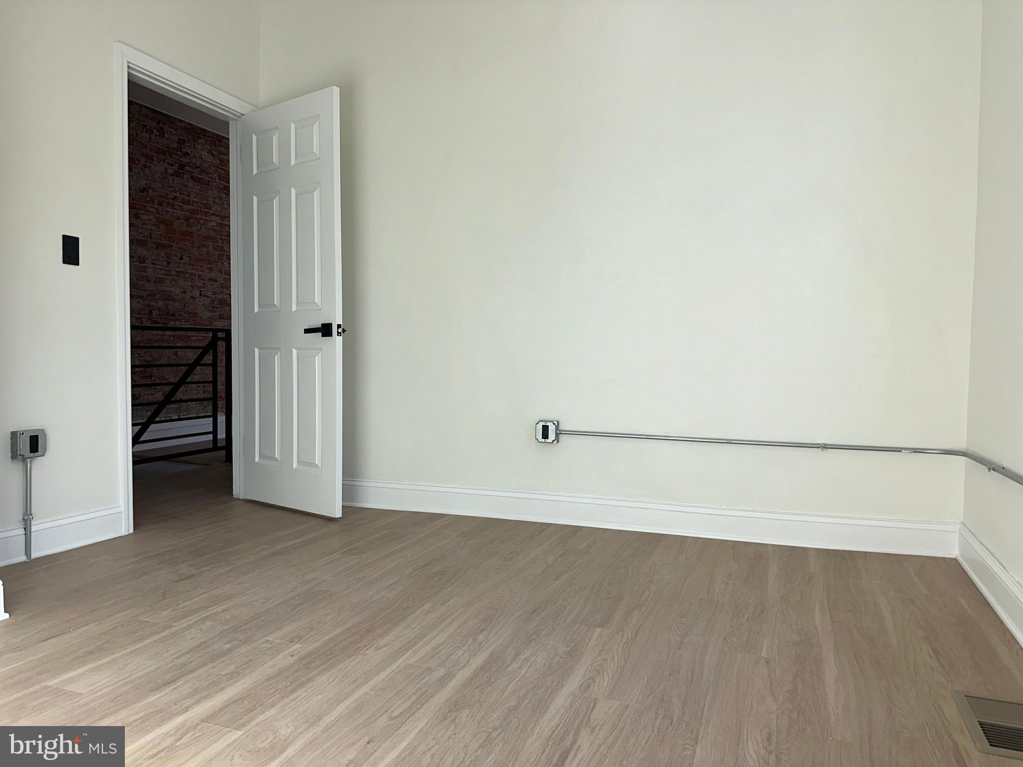 2000 Palethorp Street Philadelphia, PA 19122 - Photo 21 of 38 an empty room with wooden floor