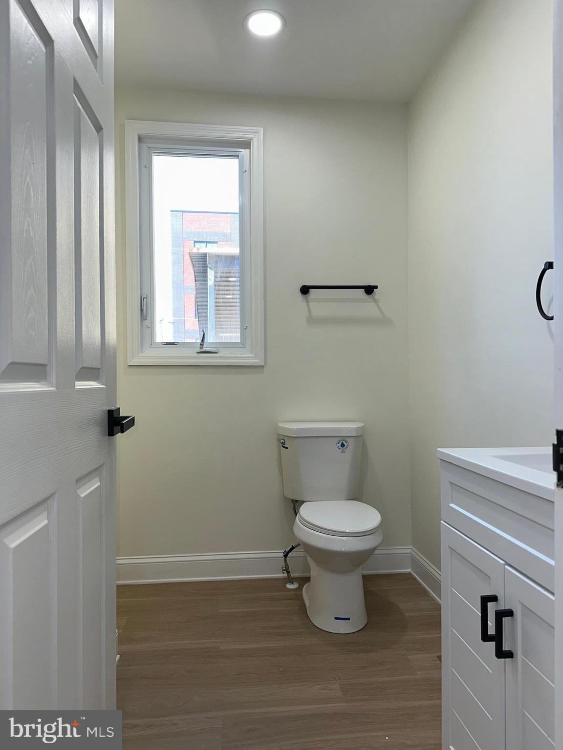 2000 Palethorp Street Philadelphia, PA 19122 - Photo 28 of 38 a white toilet sitting next to a bathroom sink