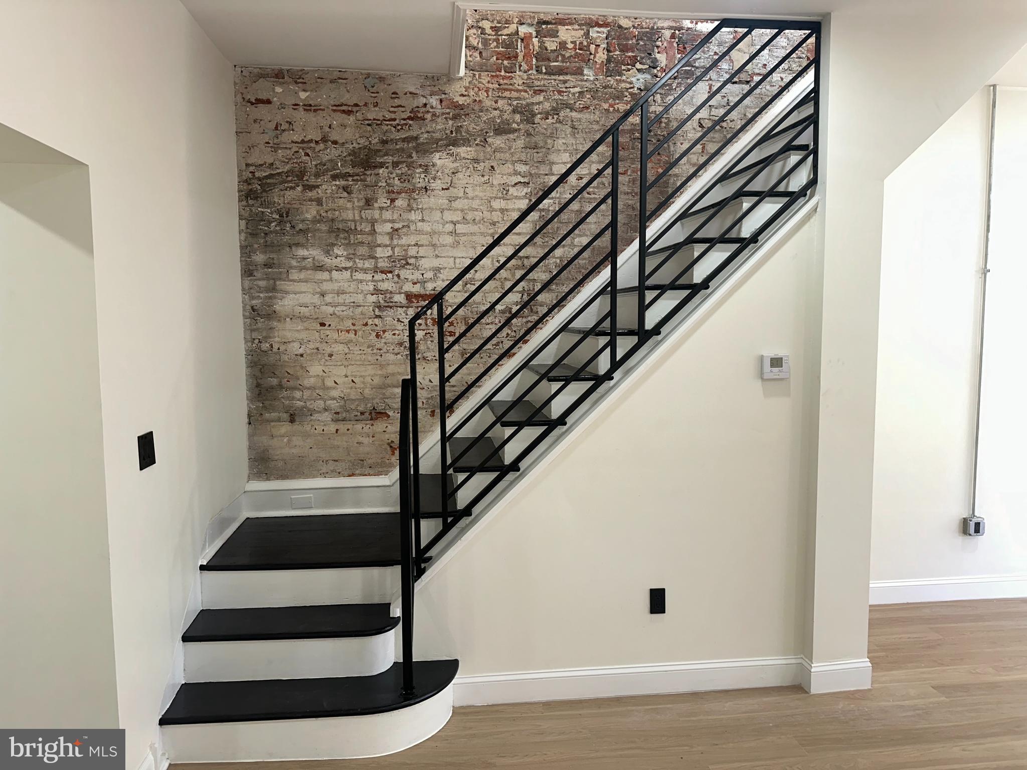 2000 Palethorp Street Philadelphia, PA 19122 - Photo 7 of 38 a view of entryway with wooden floor