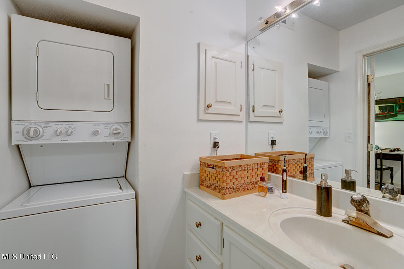 1330 Roxbury Court Jackson, MS 39211 - Photo 32 of 45 First floor vanity and laundry