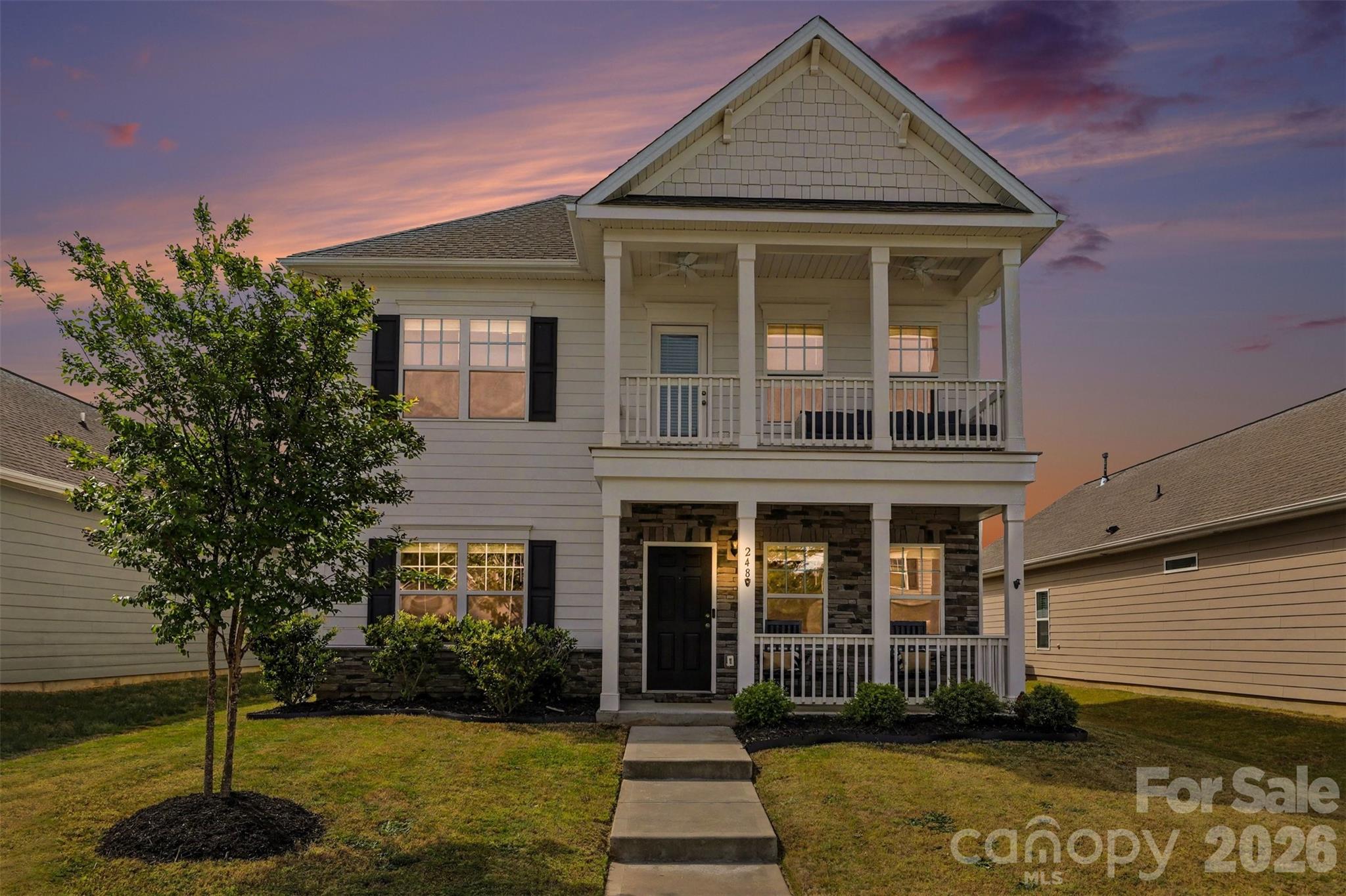 248 Kerri Dawn Lane Locust, NC 28097 - Photo 1 of 25 a front view of a house with a yard