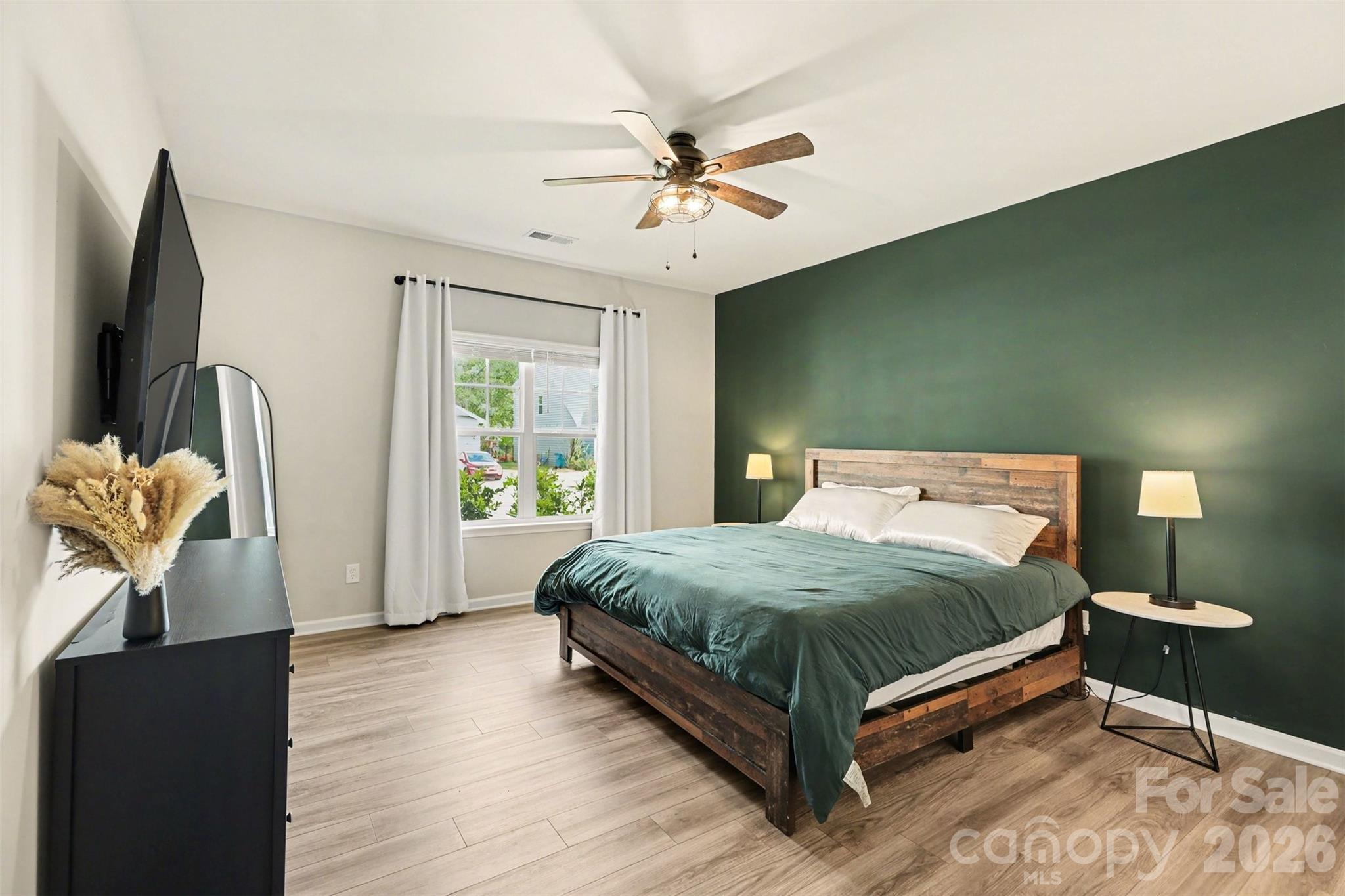 248 Kerri Dawn Lane Locust, NC 28097 - Photo 15 of 25 a bedroom with a bed and window