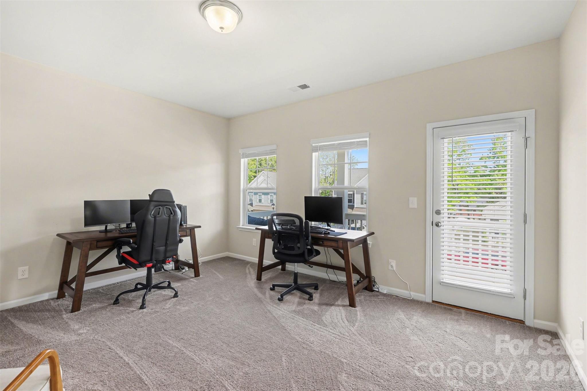 248 Kerri Dawn Lane Locust, NC 28097 - Photo 22 of 25 a view of a workspace with furniture and a window