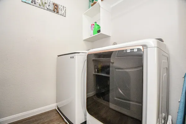 a utility room with dryer and washer
