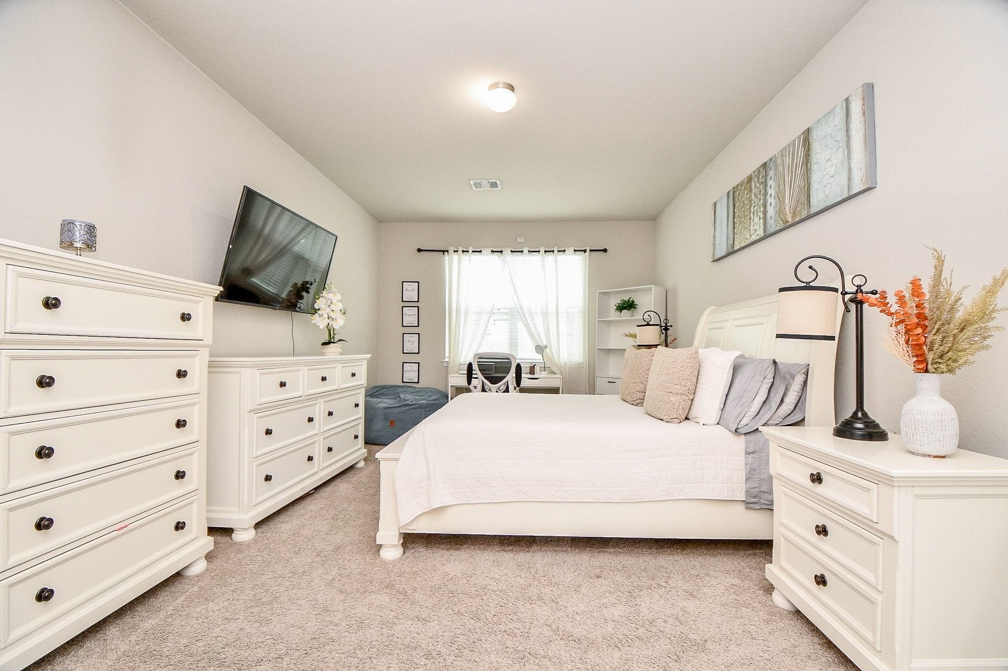 4834 Purple Wisteria Lane Spring, TX 77373 - Photo 14 of 31 Spacious primary bedroom with plenty of room to relax.