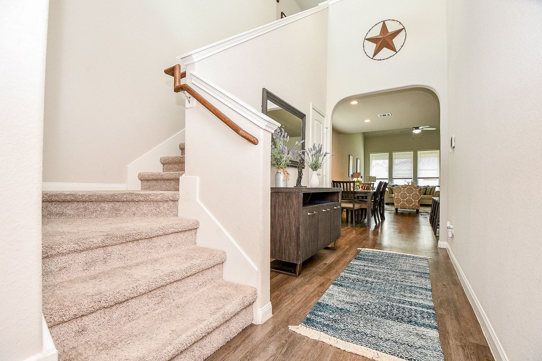 4834 Purple Wisteria Lane Spring, TX 77373 - Photo 17 of 31 Carpeted staircase leading to the second floor.