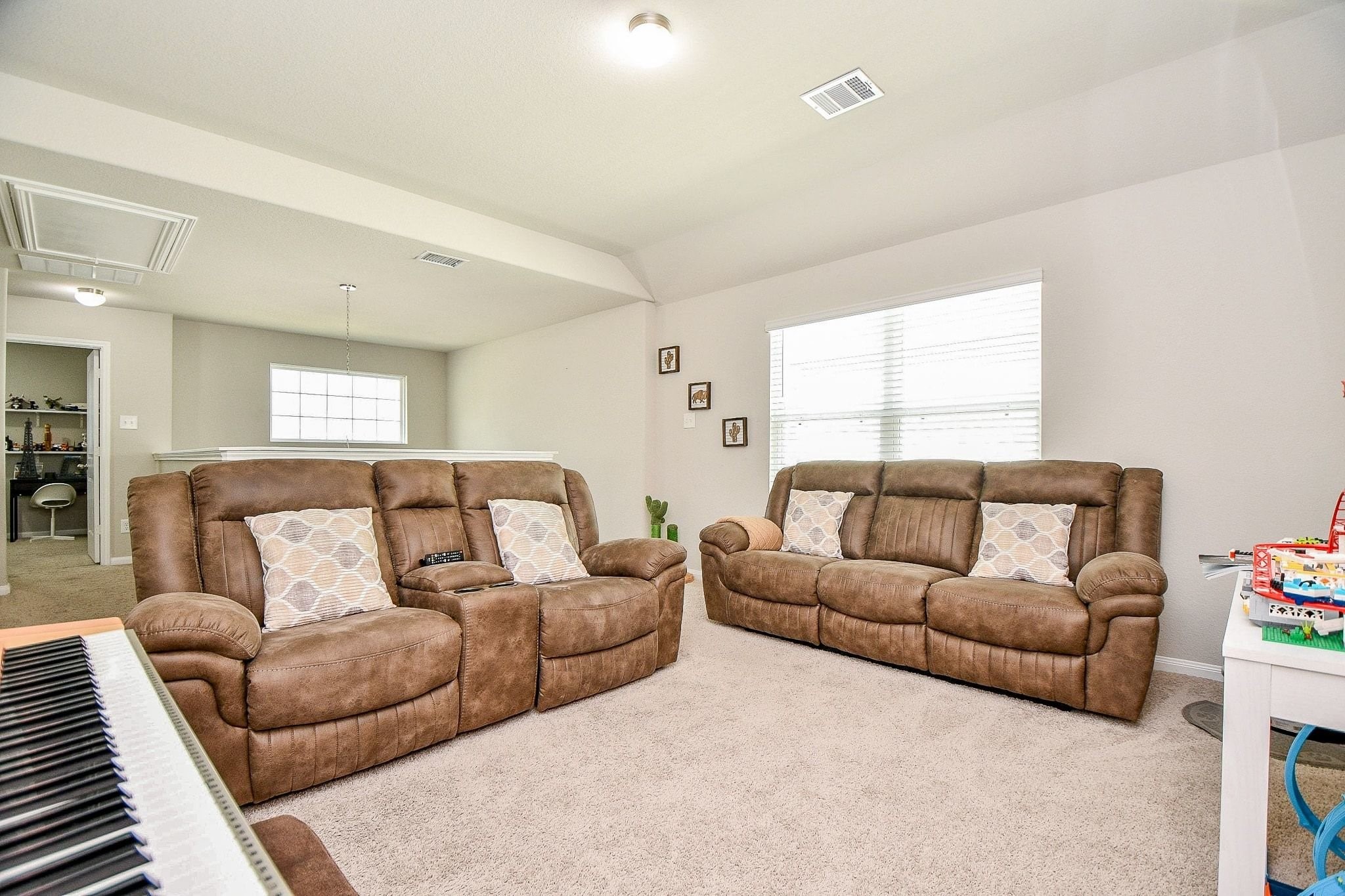 4834 Purple Wisteria Lane Spring, TX 77373 - Photo 19 of 31 Expansive upstairs gameroom with abundant natural light.