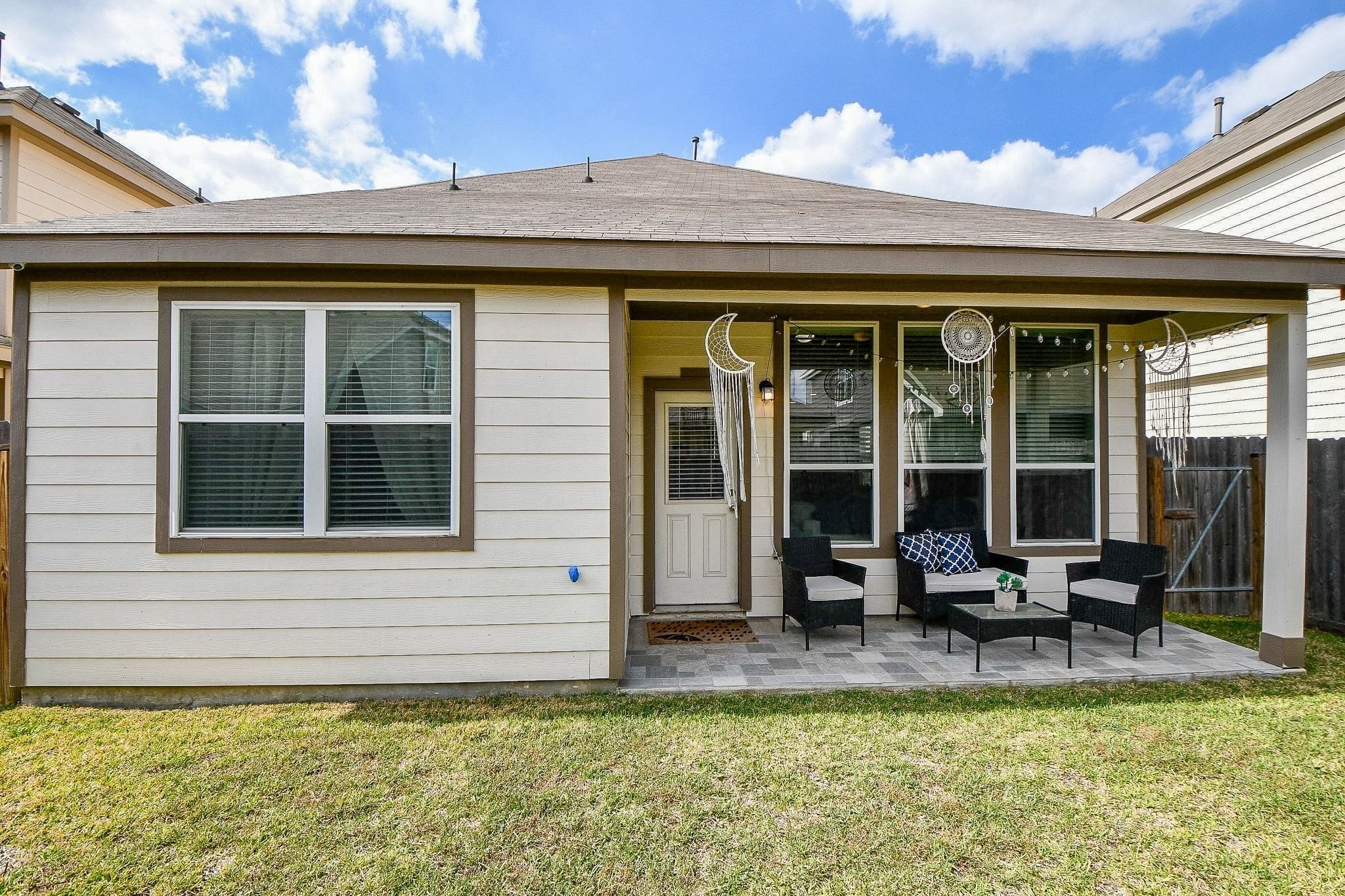 4834 Purple Wisteria Lane Spring, TX 77373 - Photo 29 of 31 Relax in the shade under the covered patio.