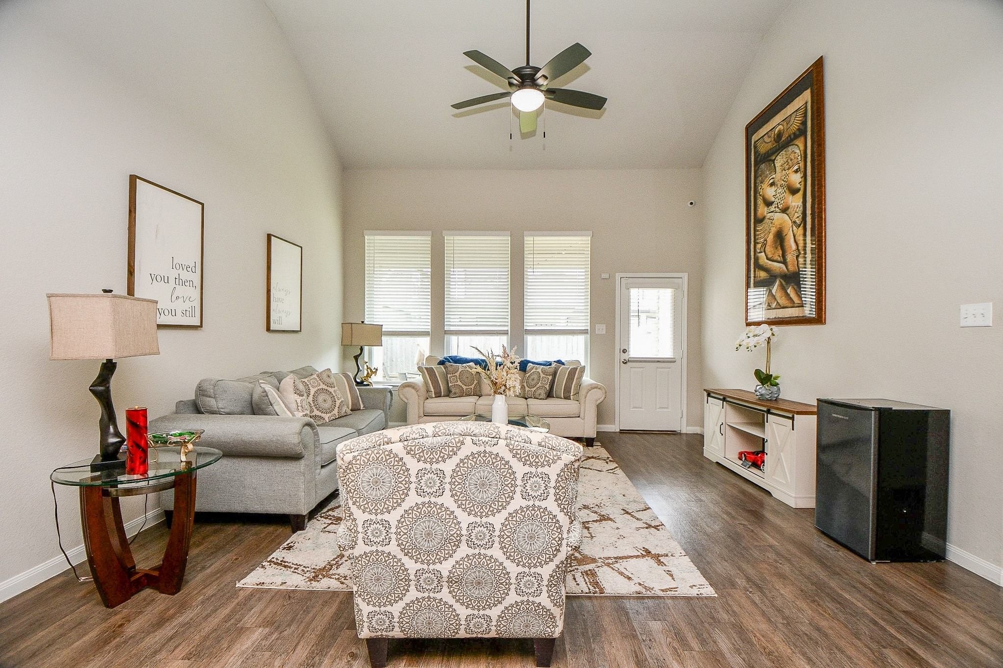 4834 Purple Wisteria Lane Spring, TX 77373 - Photo 8 of 31 Living room featuring high ceilings and a modern ceiling fan.