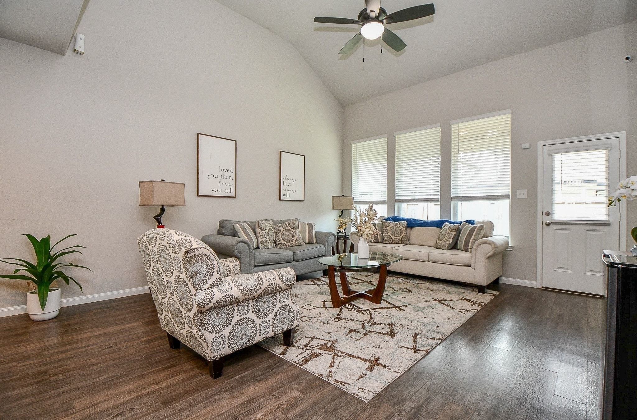 4834 Purple Wisteria Lane Spring, TX 77373 - Photo 9 of 31 Relax or entertain easily in the charming living room.