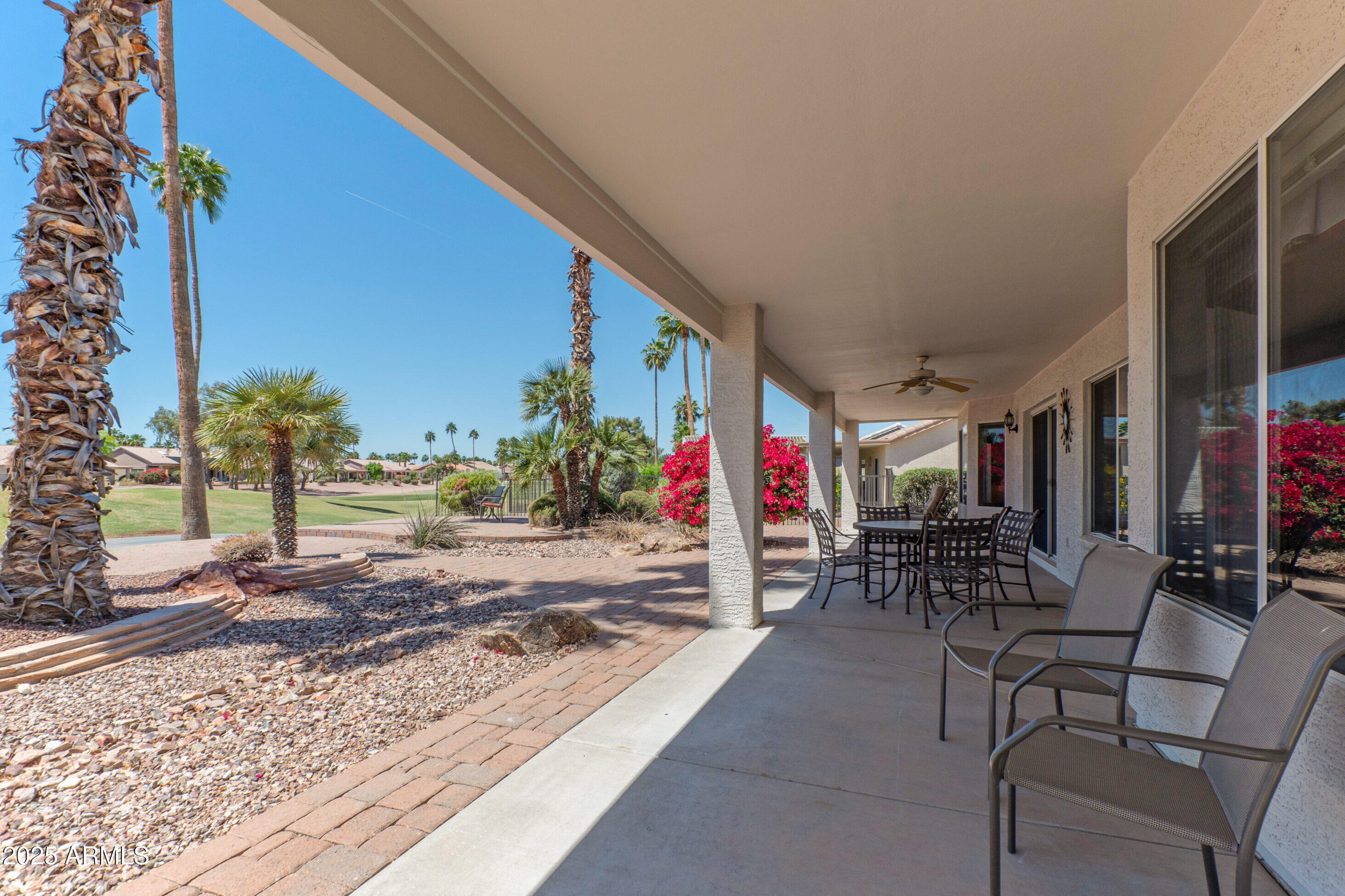 15371 Piccadilly Road Goodyear, AZ 85395 - Photo 18 of 26 swimming pool view with a seating space