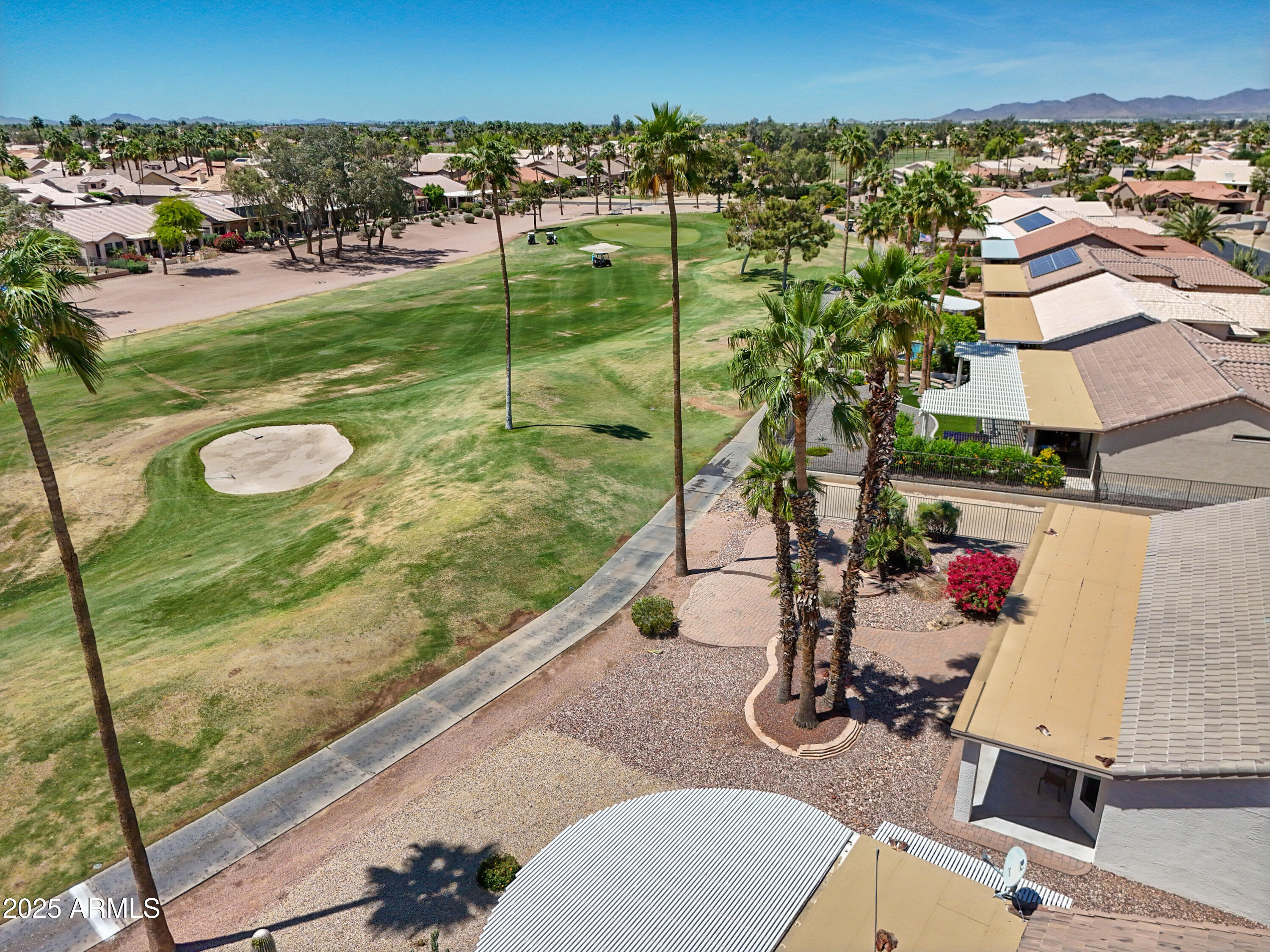 15371 Piccadilly Road Goodyear, AZ 85395 - Photo 25 of 26 an aerial view of a house with yard swimming pool and outdoor seating