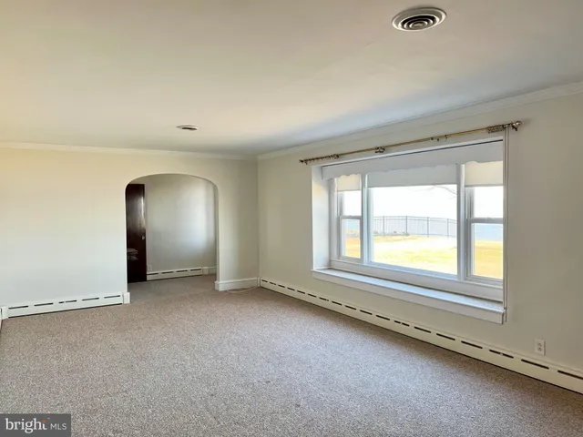 an empty room with a window