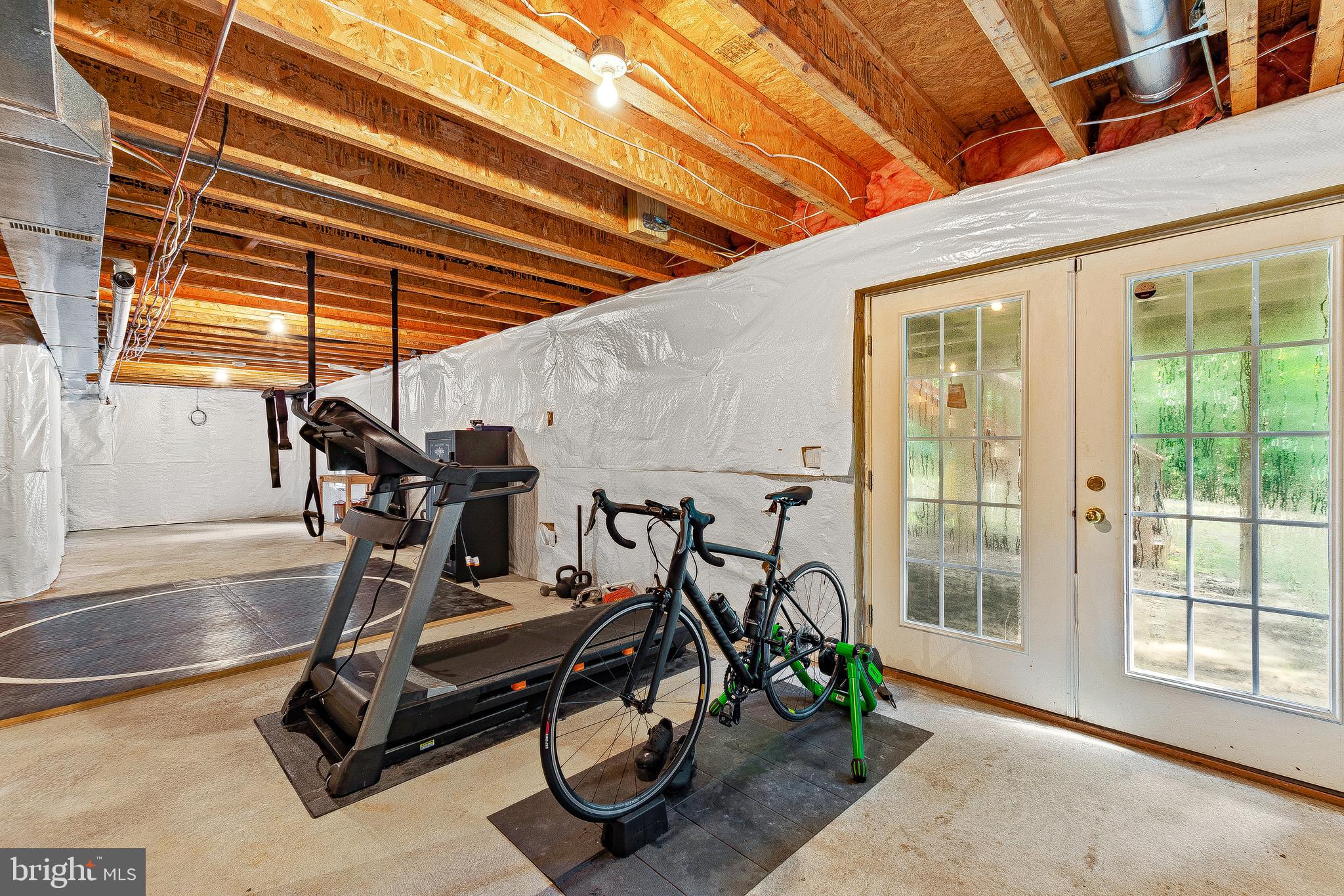5270 Mackall Road St. Leonard, MD 20685 - Photo 28 of 42 a view of a room with gym equipment