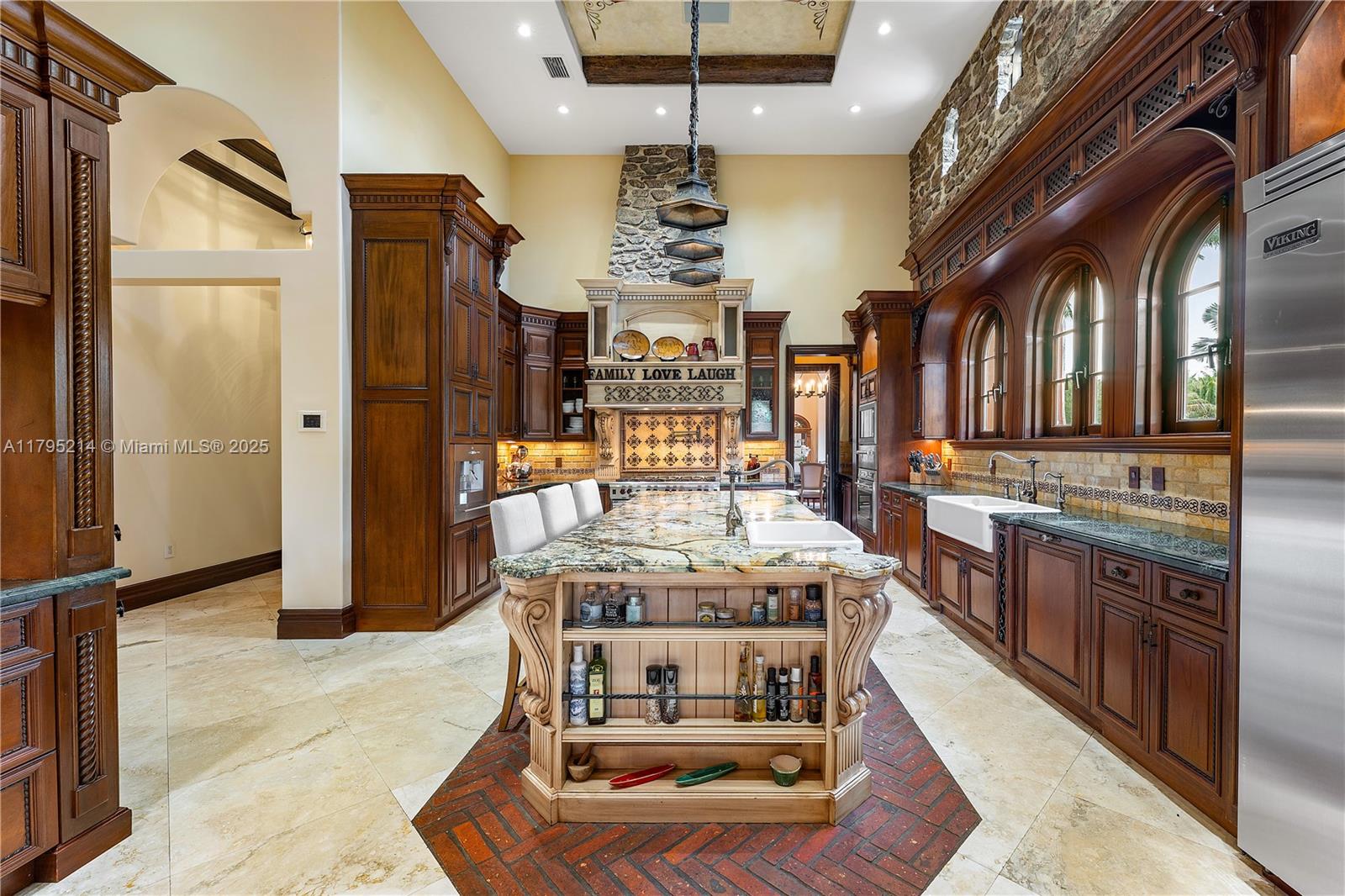 17201 Southwest 248th Street Homestead, FL 33031 - Photo 15 of 78 a kitchen with stainless steel appliances granite countertop a stove and a refrigerator