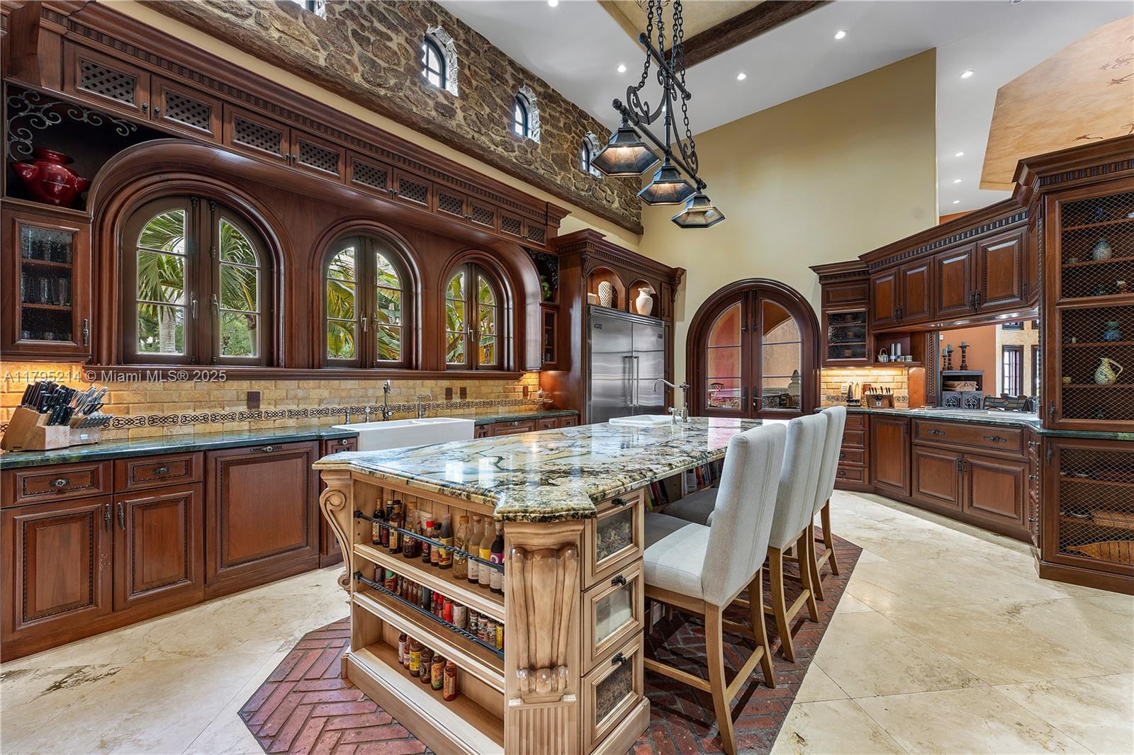 17201 Southwest 248th Street Homestead, FL 33031 - Photo 17 of 78 a living room with stainless steel appliances granite countertop a kitchen island a sink a stove and cabinets