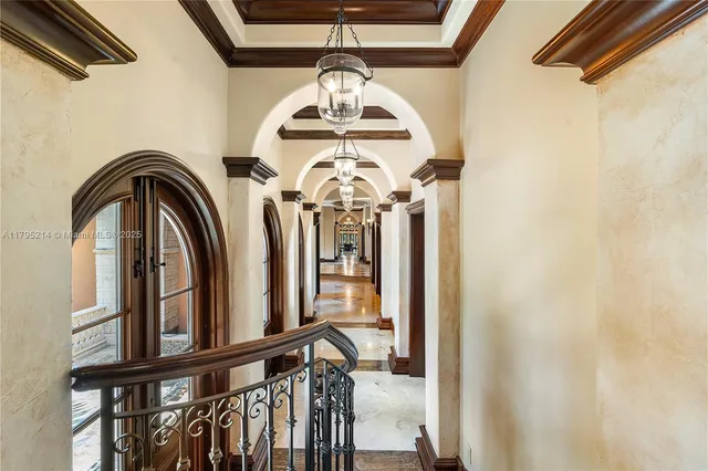 a bedroom with bed and wooden floor