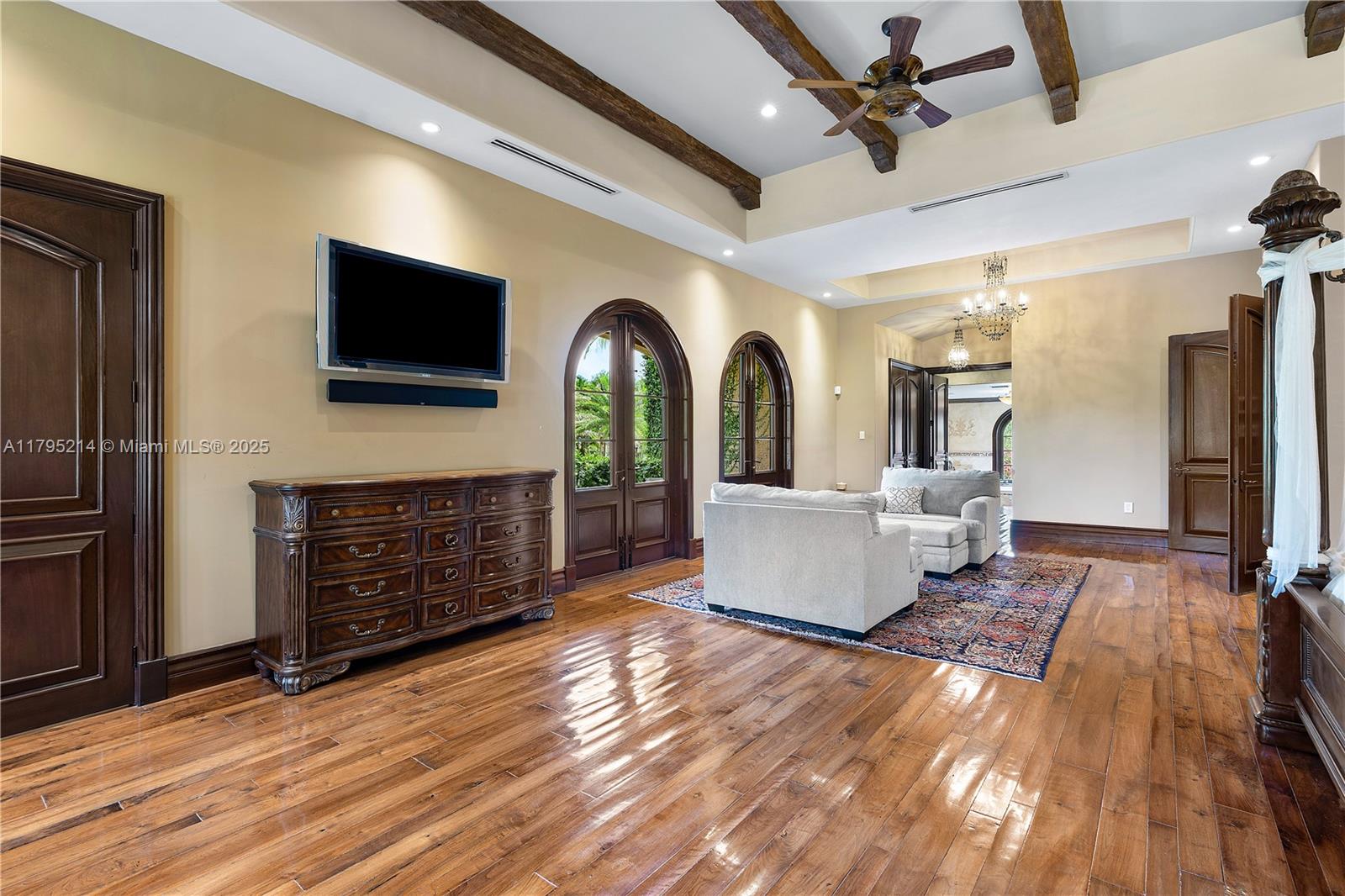 17201 Southwest 248th Street Homestead, FL 33031 - Photo 27 of 78 a living room with furniture and a flat screen tv