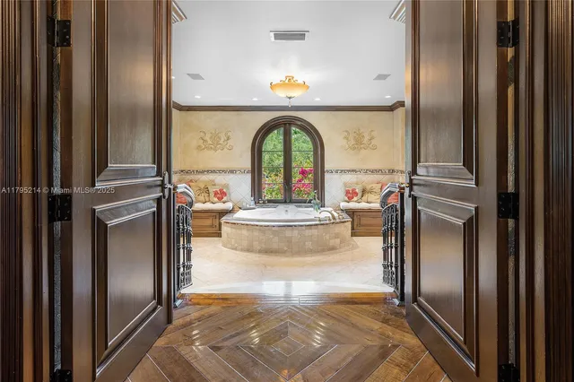 a bathroom with a sink a mirror and a shower