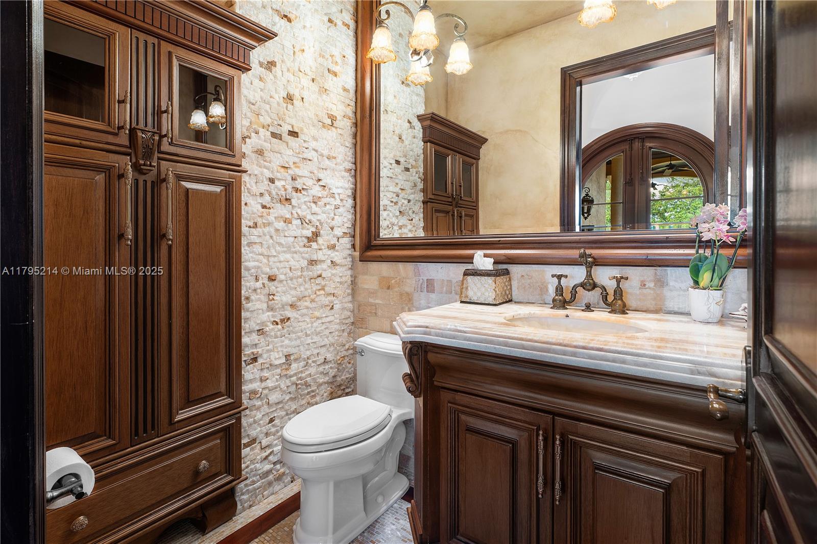 17201 Southwest 248th Street Homestead, FL 33031 - Photo 32 of 78 a bathroom with a sink a toilet and shower