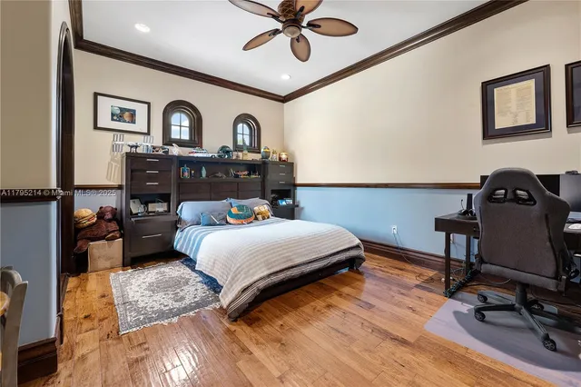 a view of a house with swimming pool and sitting area