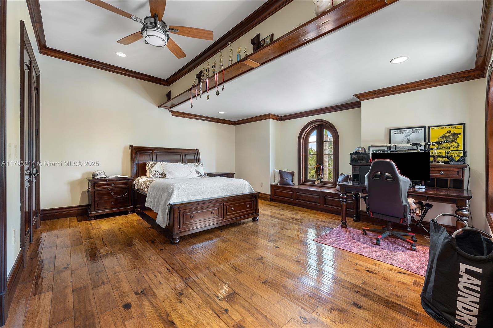 17201 Southwest 248th Street Homestead, FL 33031 - Photo 35 of 78 a bedroom with bed and wooden floor