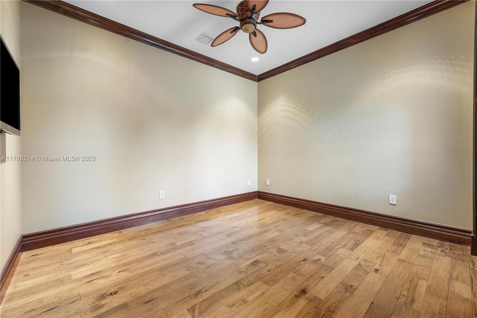 17201 Southwest 248th Street Homestead, FL 33031 - Photo 37 of 78 a view of a room with a window and a ceiling fan