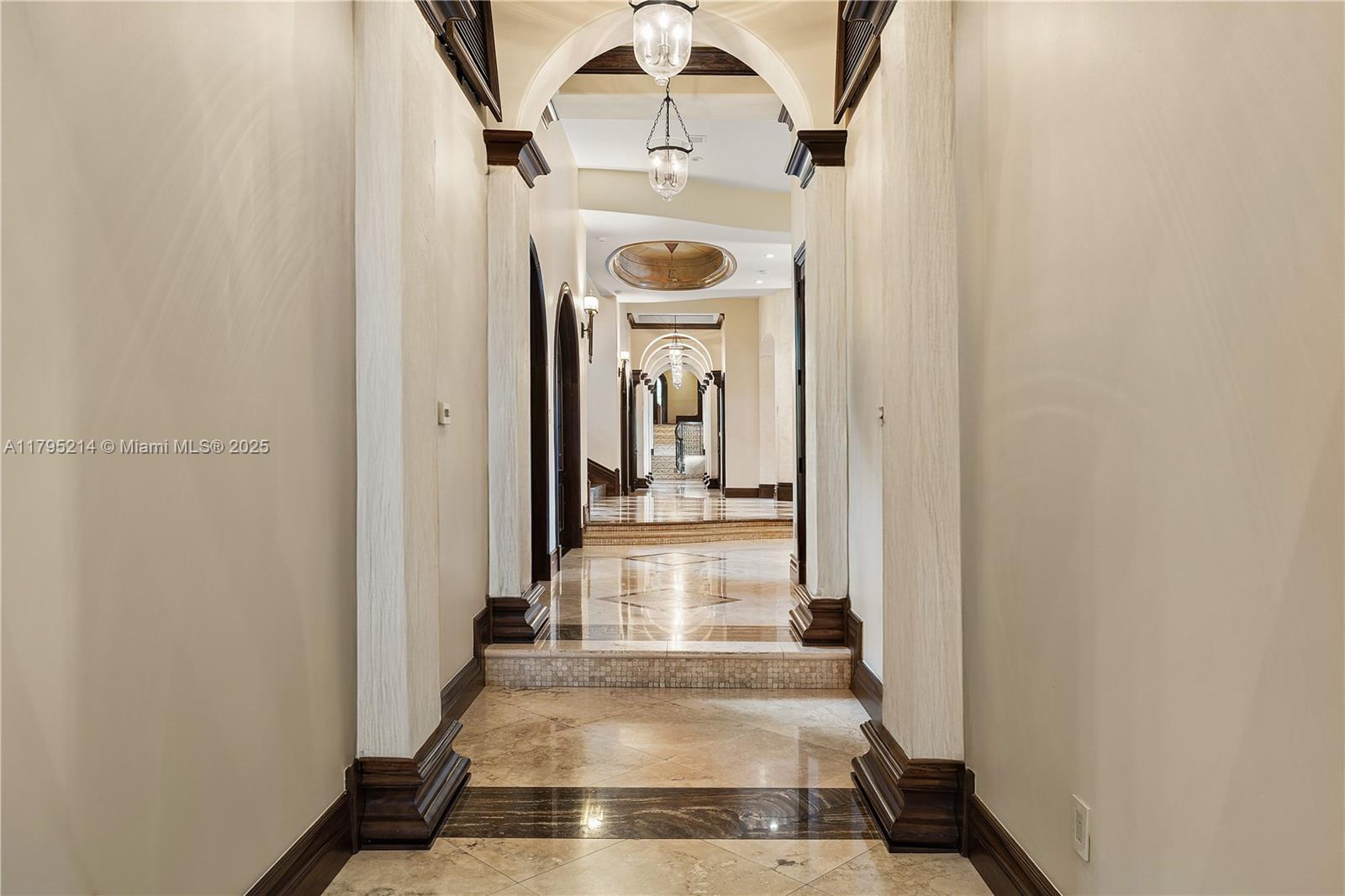 17201 Southwest 248th Street Homestead, FL 33031 - Photo 40 of 78 a view of a hallway with wooden floor and a fireplace
