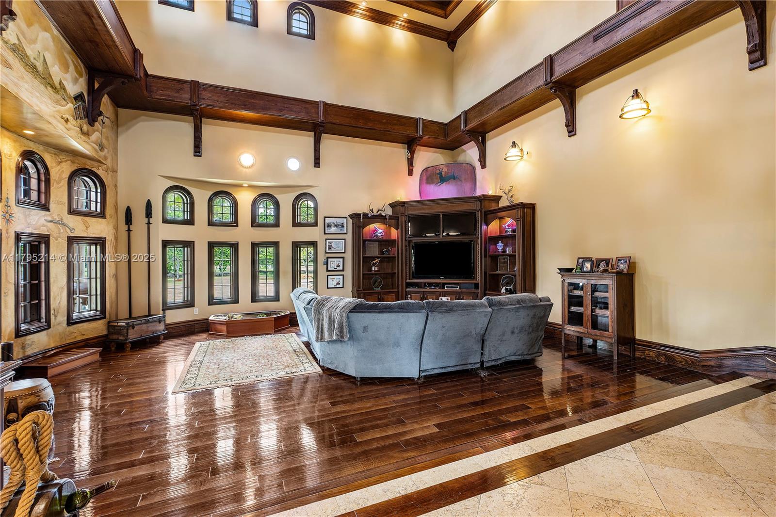 17201 Southwest 248th Street Homestead, FL 33031 - Photo 46 of 78 a living room with furniture and a fireplace