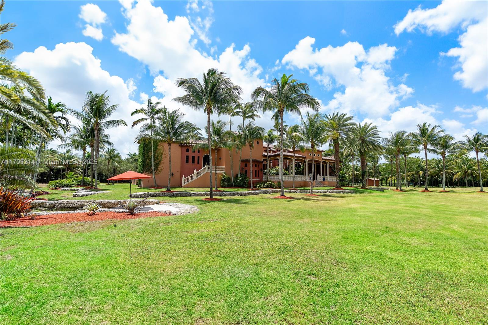17201 Southwest 248th Street Homestead, FL 33031 - Photo 52 of 78 a view of a house with swimming pool and sitting area