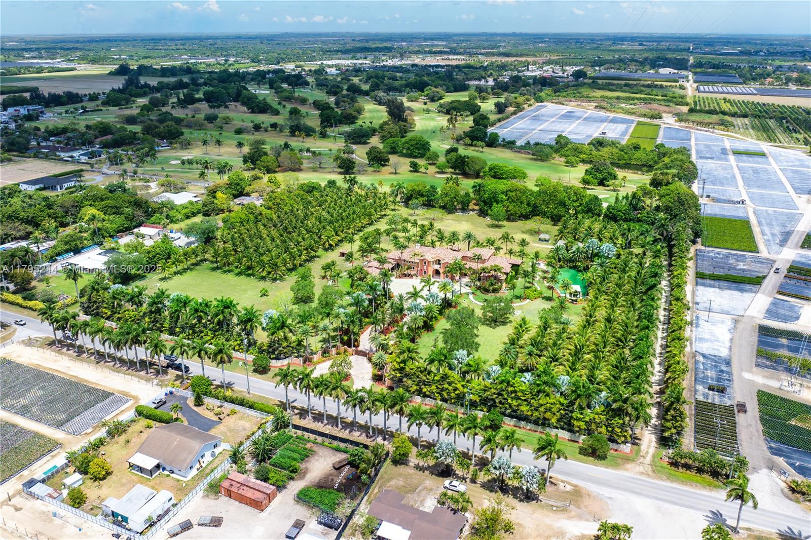 17201 Southwest 248th Street Homestead, FL 33031 - Photo 71 of 78 an aerial view of residential houses with outdoor space and trees