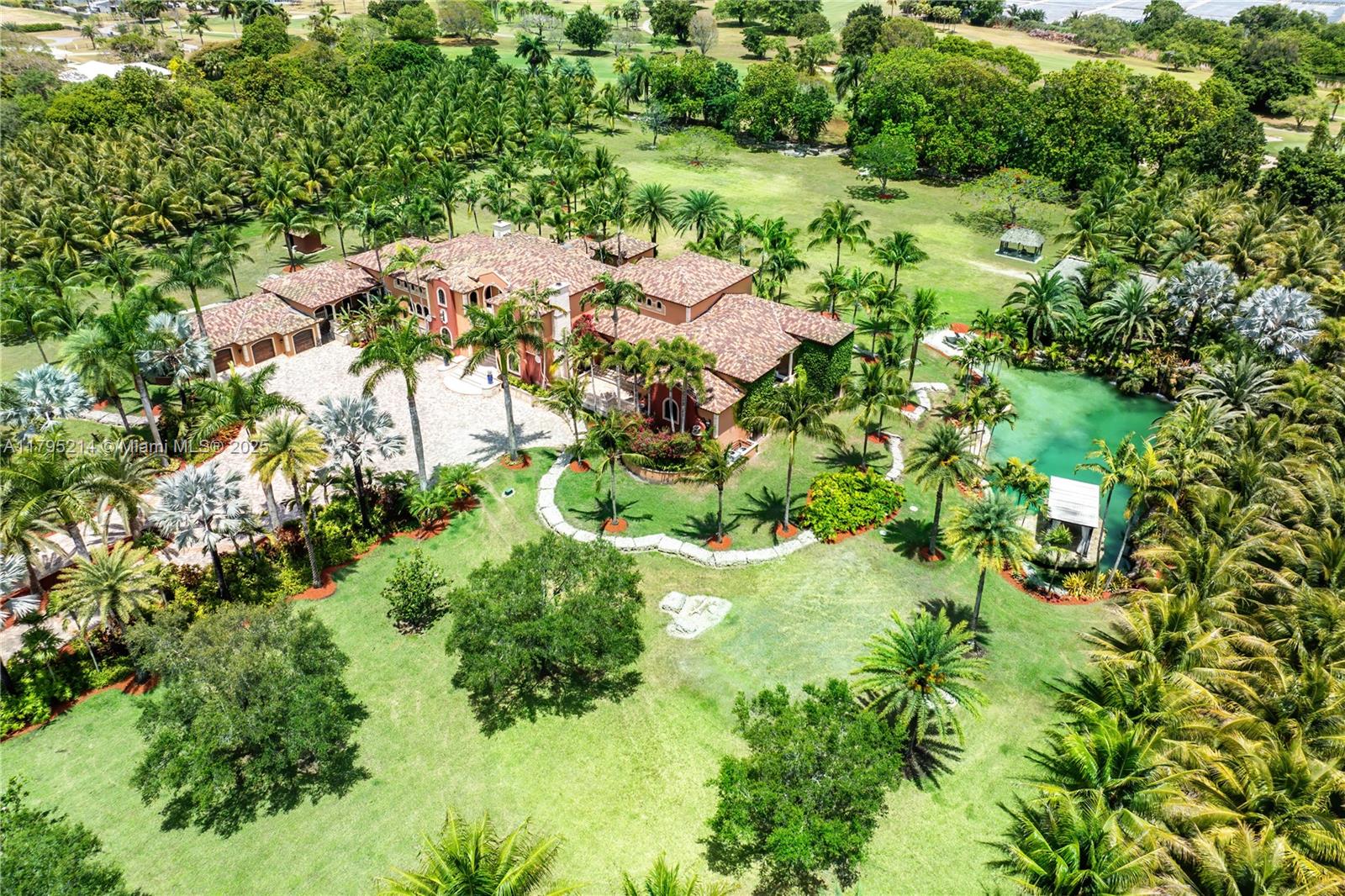 17201 Southwest 248th Street Homestead, FL 33031 - Photo 72 of 78 an aerial view of residential house with outdoor space and trees all around