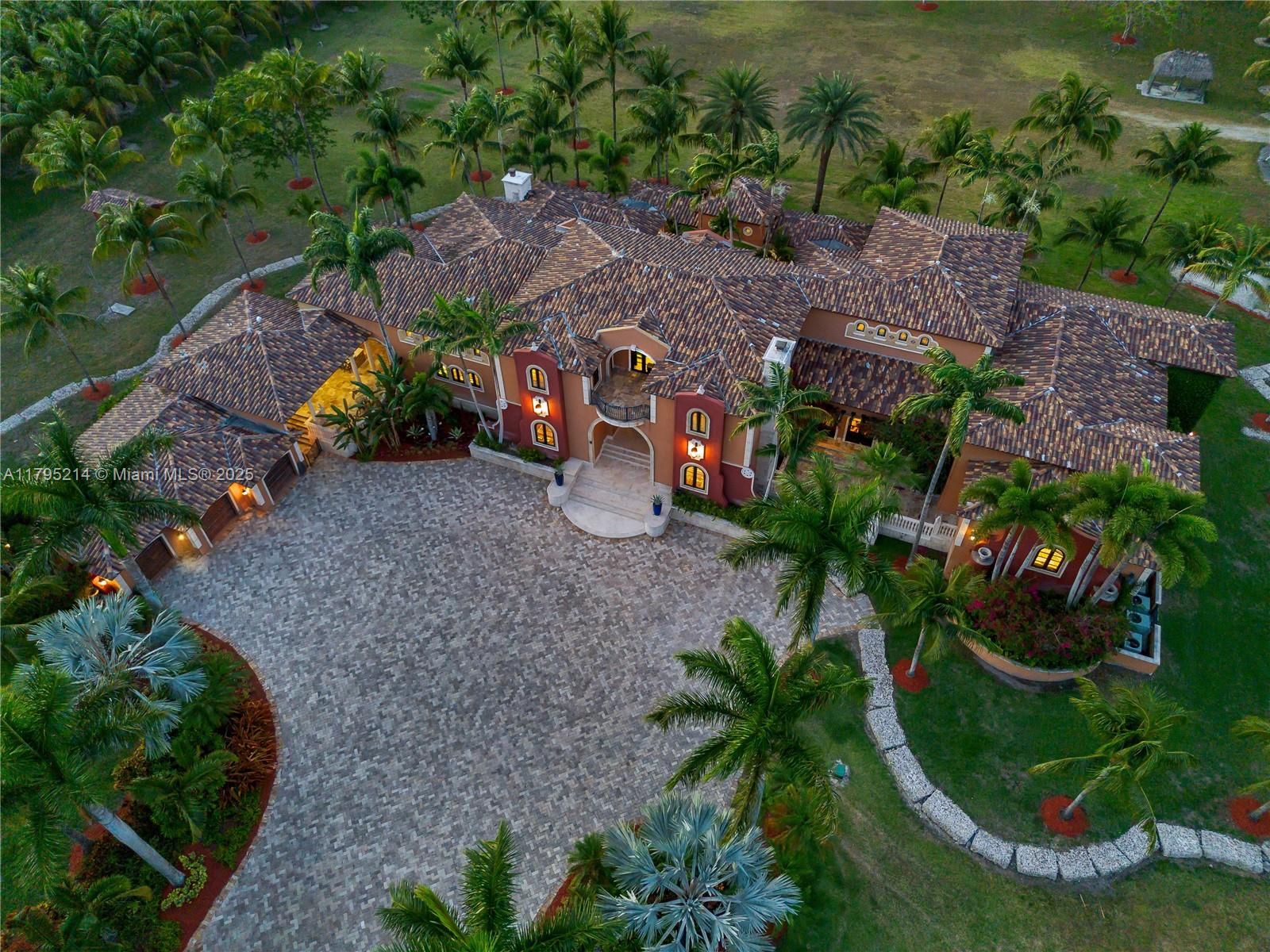 17201 Southwest 248th Street Homestead, FL 33031 - Photo 77 of 78 an aerial view of a house with garden space and street view