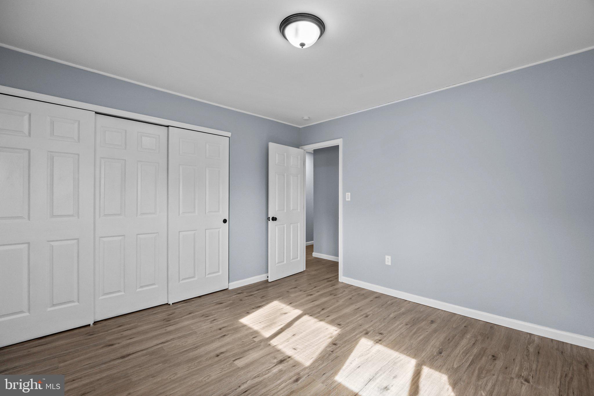 26 Oaktree Drive Levittown, PA 19055 - Photo 13 of 19 a view of a livingroom with wooden floor