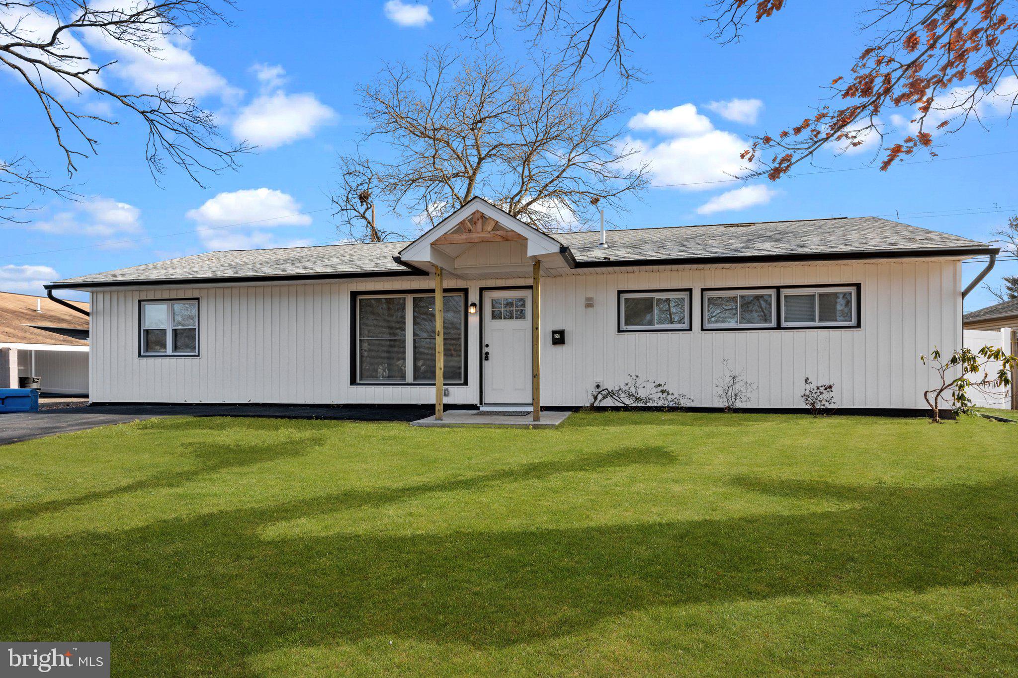 26 Oaktree Drive Levittown, PA 19055 - Photo 2 of 19 a view of a house with a backyard