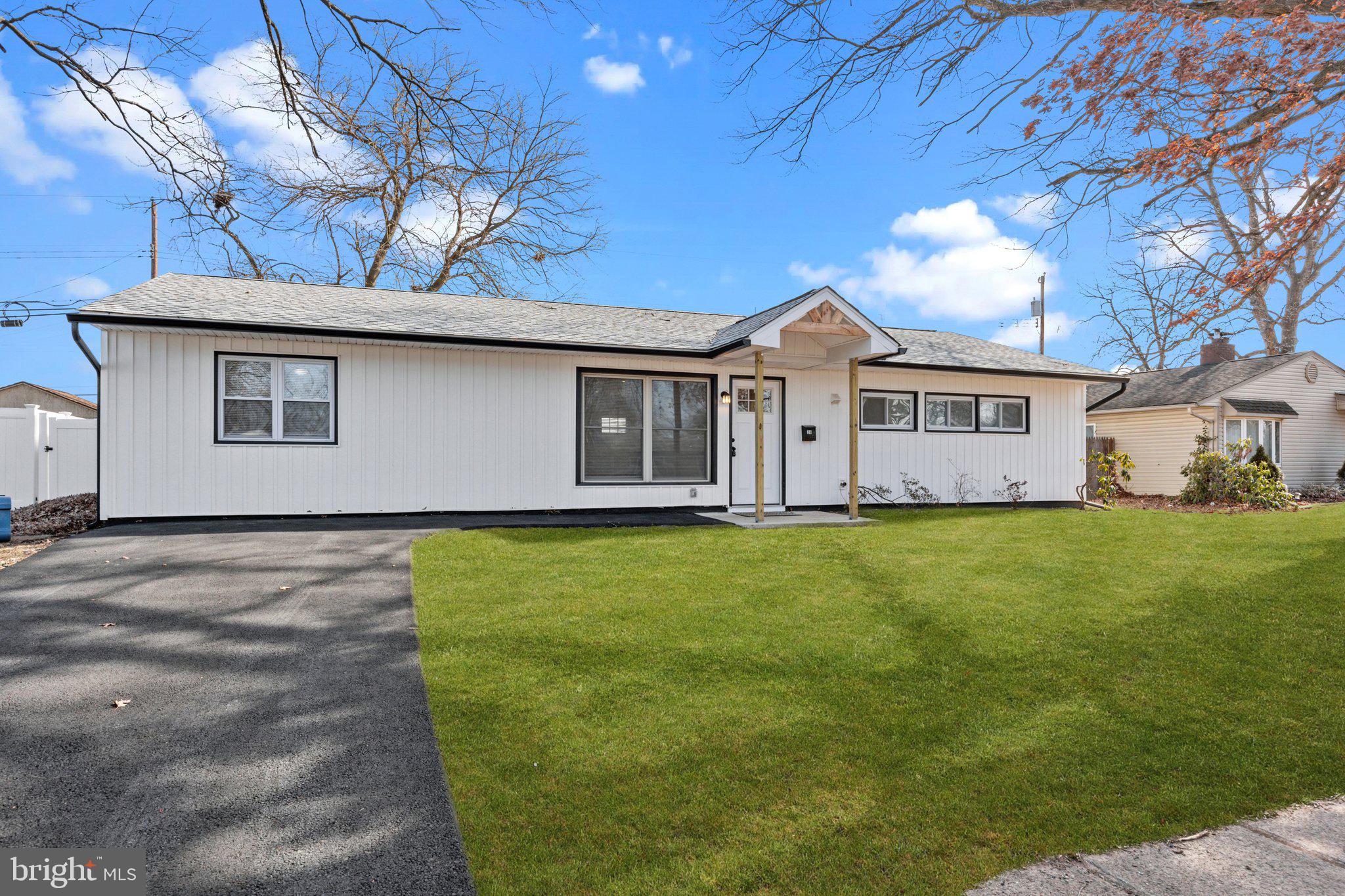 26 Oaktree Drive Levittown, PA 19055 - Photo 3 of 19 a view of a house with a garden