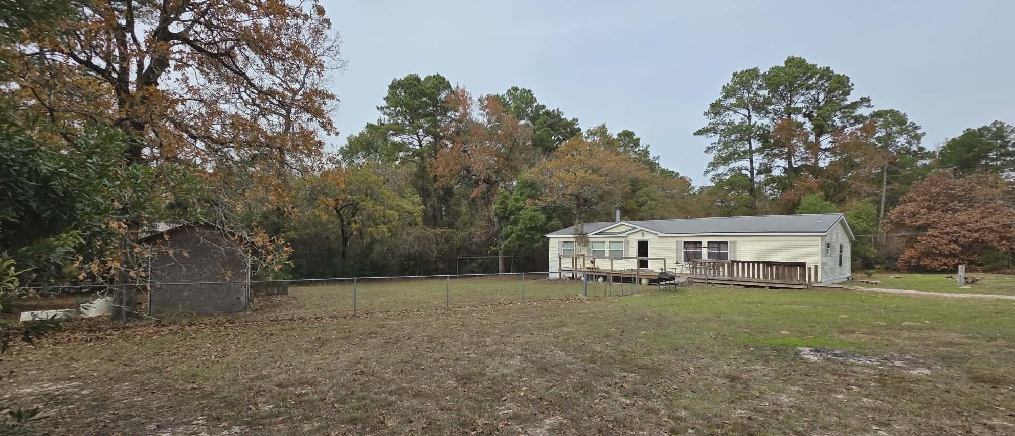 14606 Edwards Road Montgomery, TX 77316 - Photo 18 of 19 a view of a house with a yard