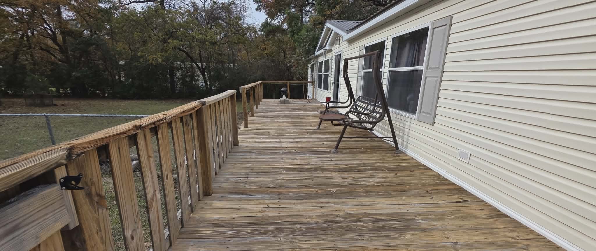 14606 Edwards Road Montgomery, TX 77316 - Photo 2 of 19 a view of deck with wooden floor and stairs