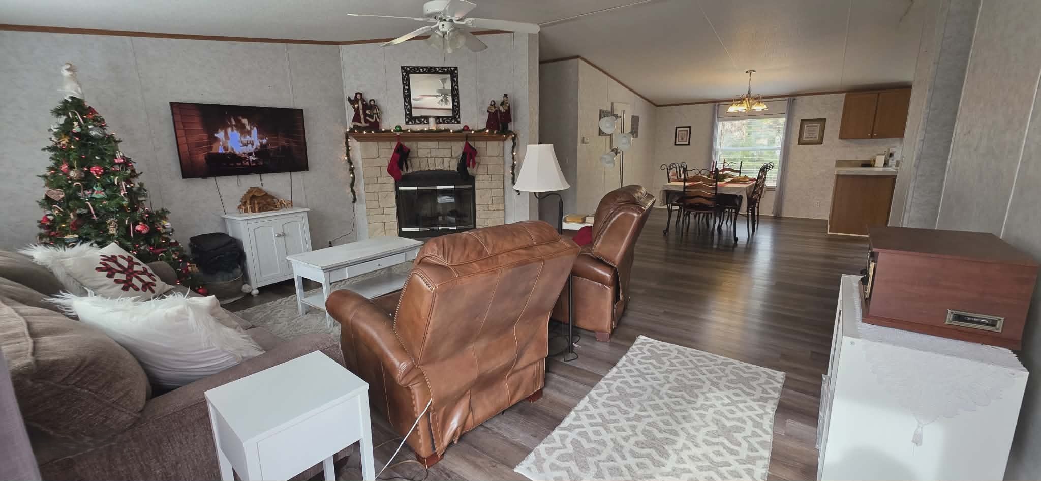 14606 Edwards Road Montgomery, TX 77316 - Photo 4 of 19 a living room with furniture and a fireplace