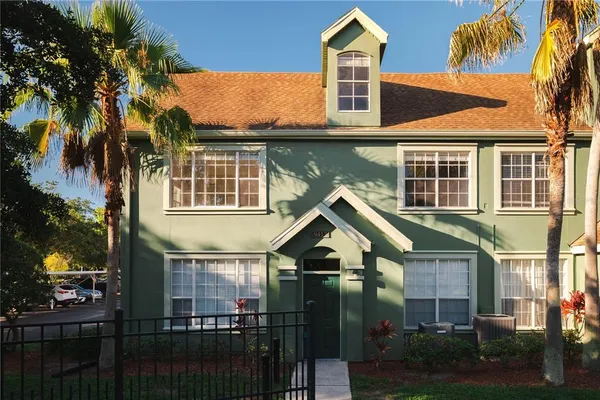 a front view of a house with a porch