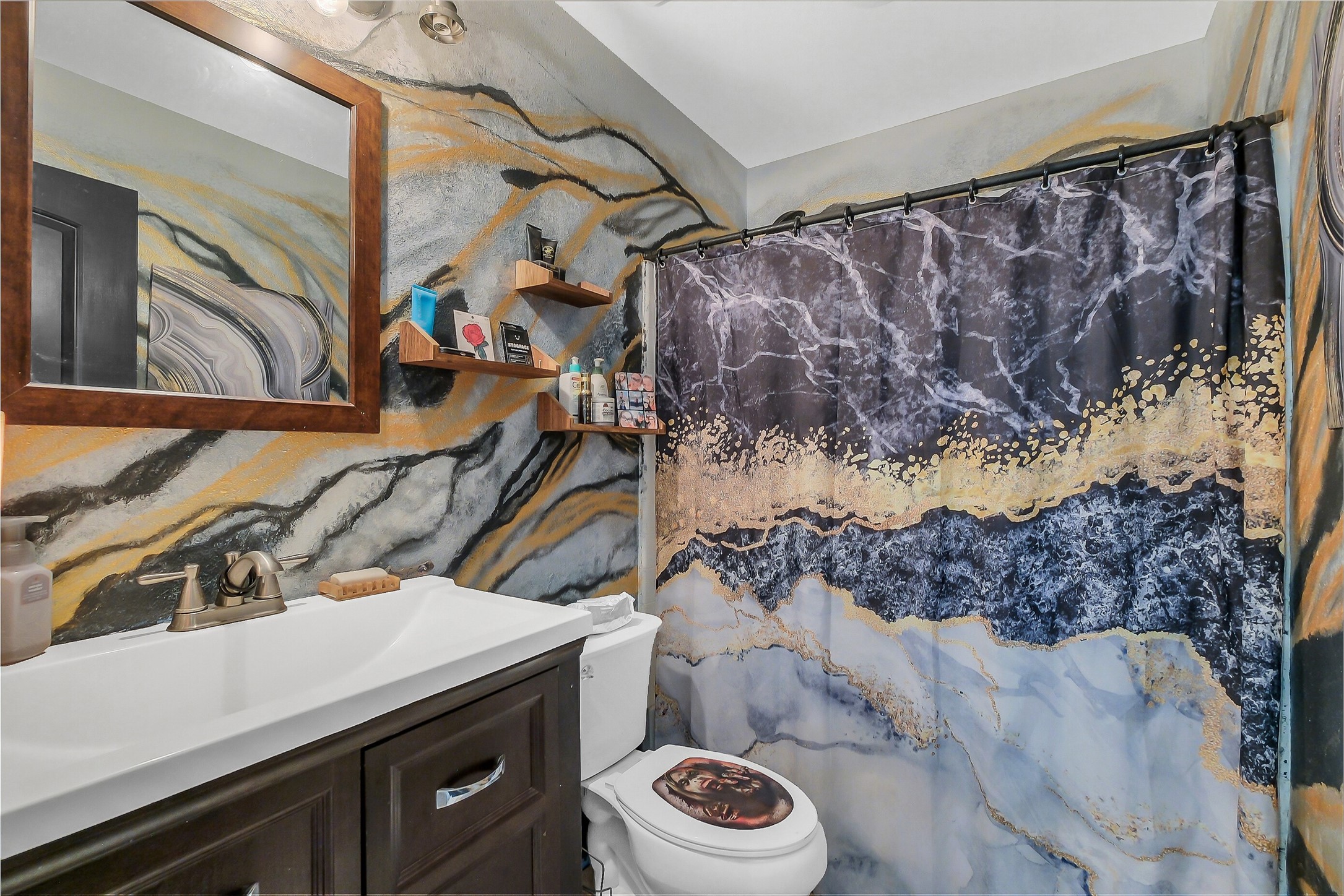 603 Hackamore Road Simonton, TX 77485 - Photo 15 of 21 a bathroom with a sink a toilet and a mirror